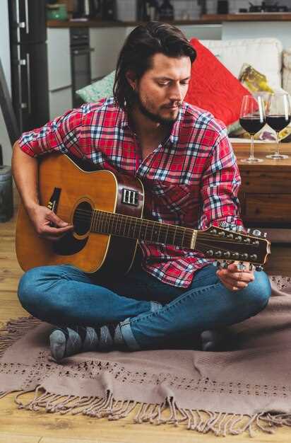 La técnica de fingerpicking en la guitarra acústica